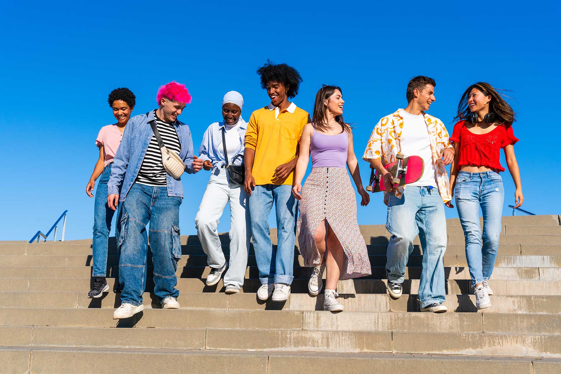 A group of young people walking together.
